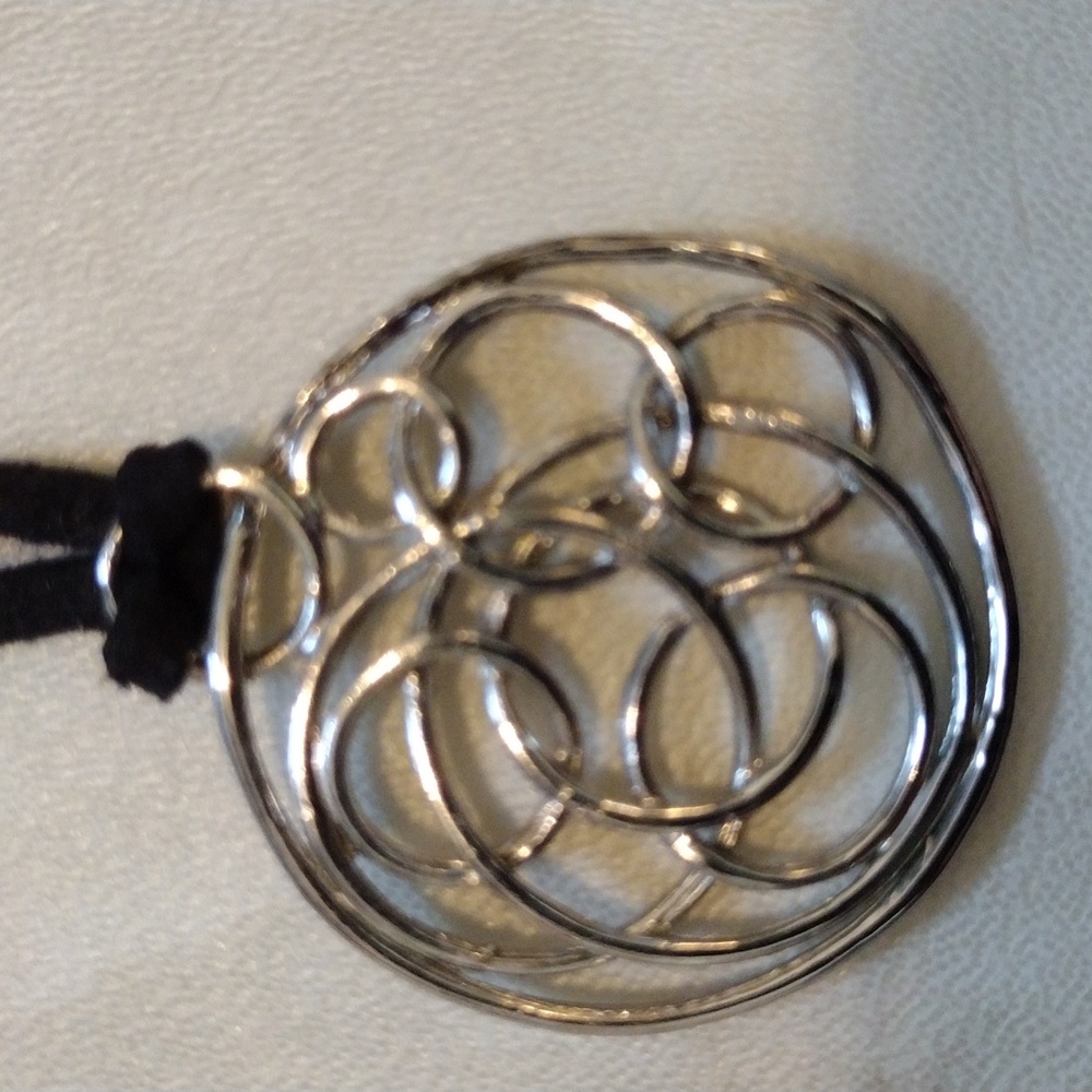 Lia Sofia faux silver pendant on twine necklace.